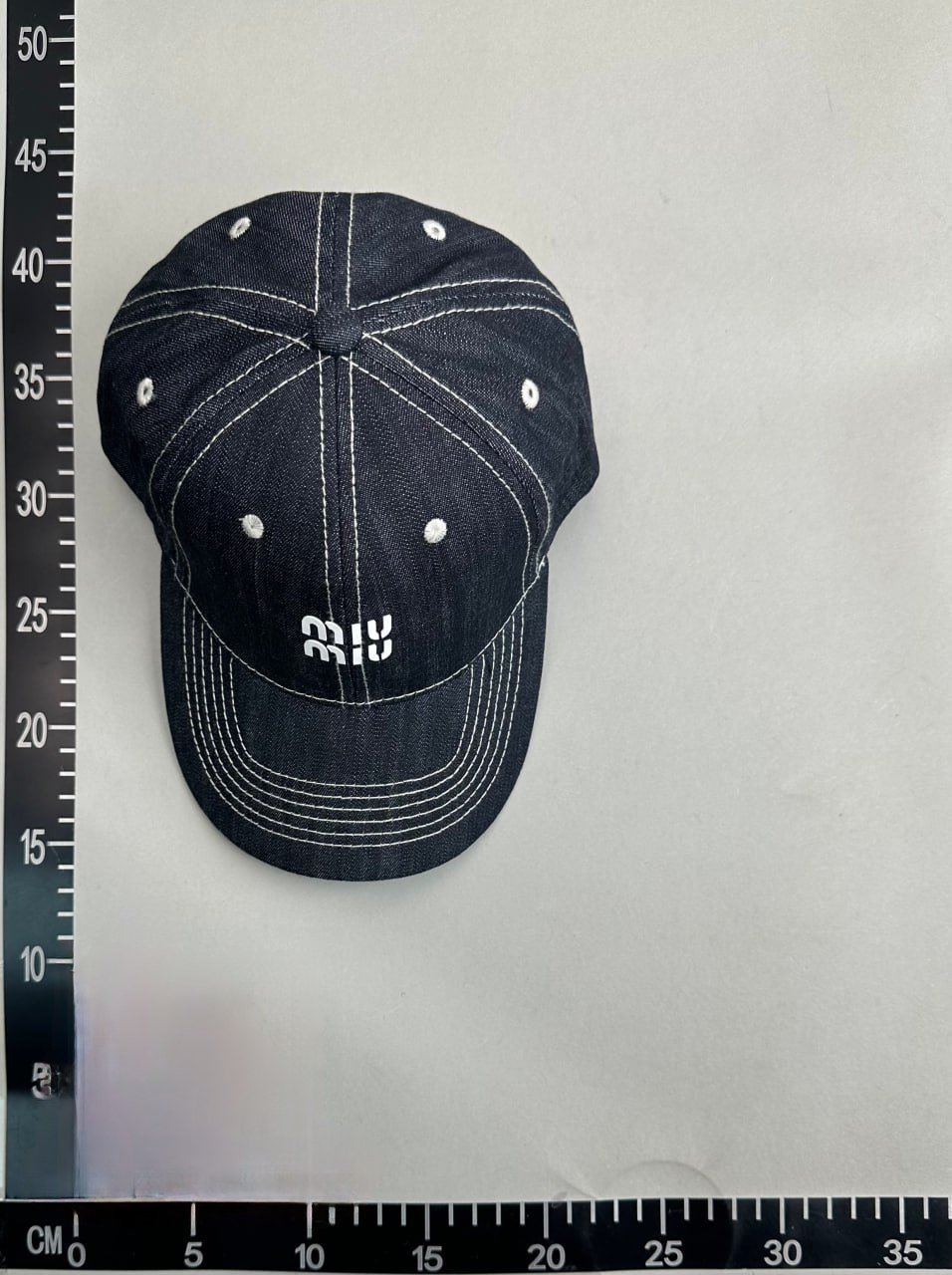 Prada hatFendi hatStone Island hat